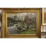 A large early 20th century watercolour mounted in a gesso frame of a rural river landscape possibly
