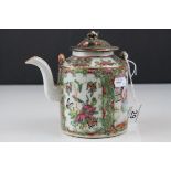 Cantonese Famille Rose Teapot with enamel decorated panels of figures and butterflies in foliage,