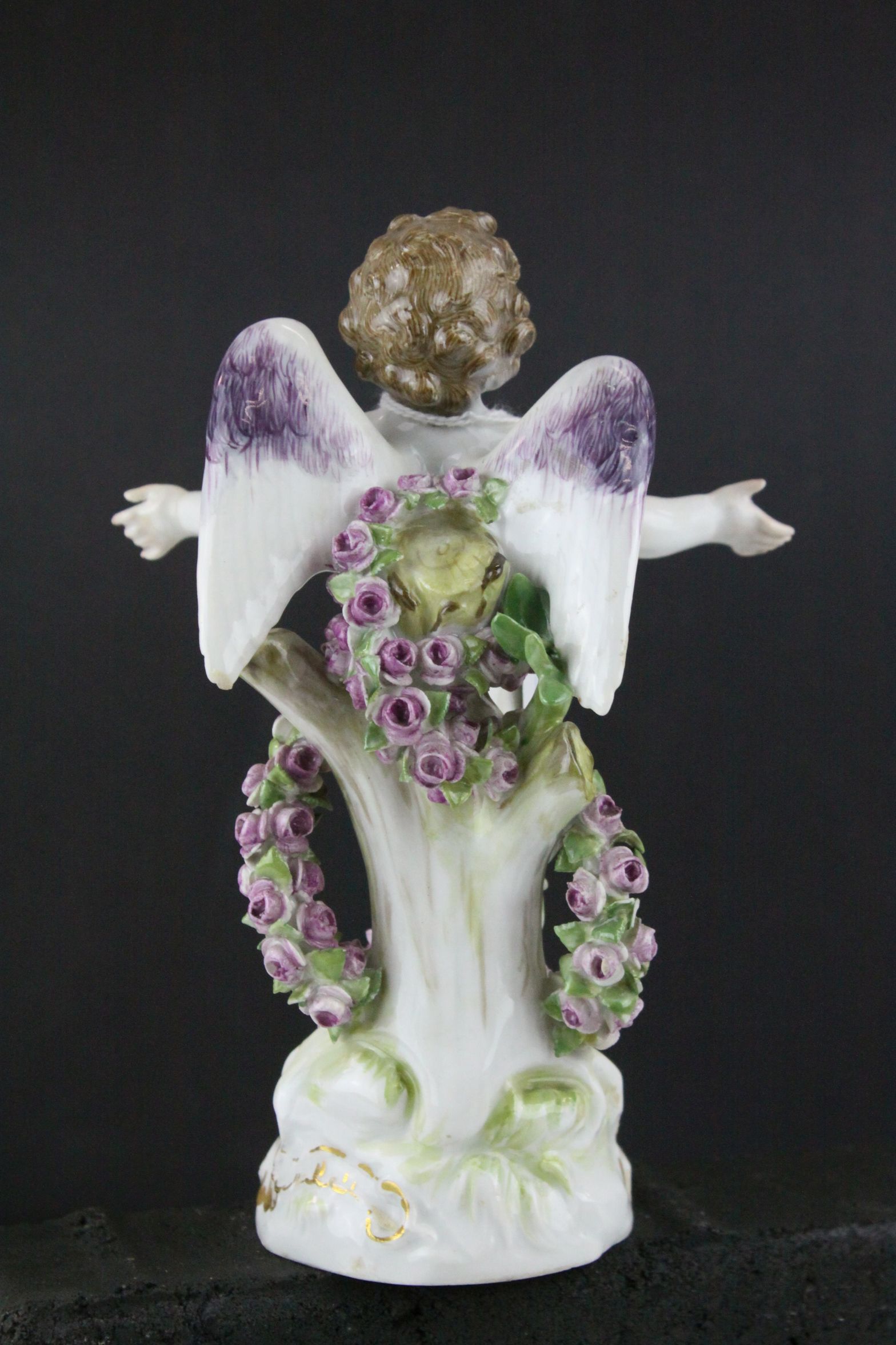 Meissen Porcelain Figure of Cupid with open arms, the base decorated with gilt scrolls, blue cross - Image 6 of 10