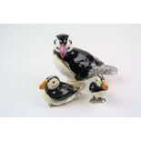 Two Hallmarked sterling silver and enamel Puffin figures together with a trinket box in the form