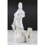Chinese Blanc de Chine Figure of Guanyin, 31cms high together with a Blanc de Chine Dog of Foe,
