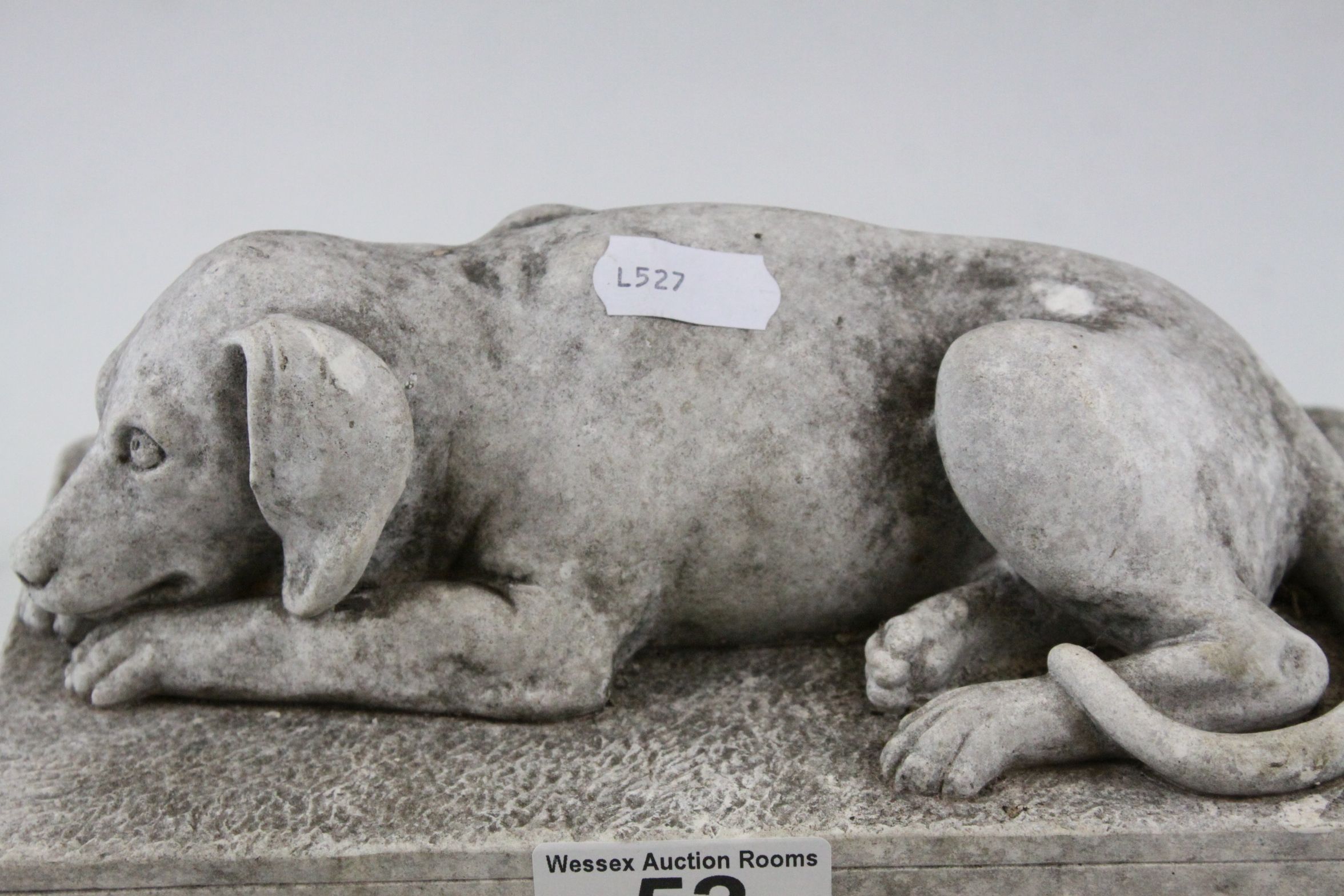 A stone effect scuplture of a recumbent dog. - Image 4 of 4