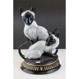 Metal Painted Doorstop in the form of Two Siamese Cats, 36cms high