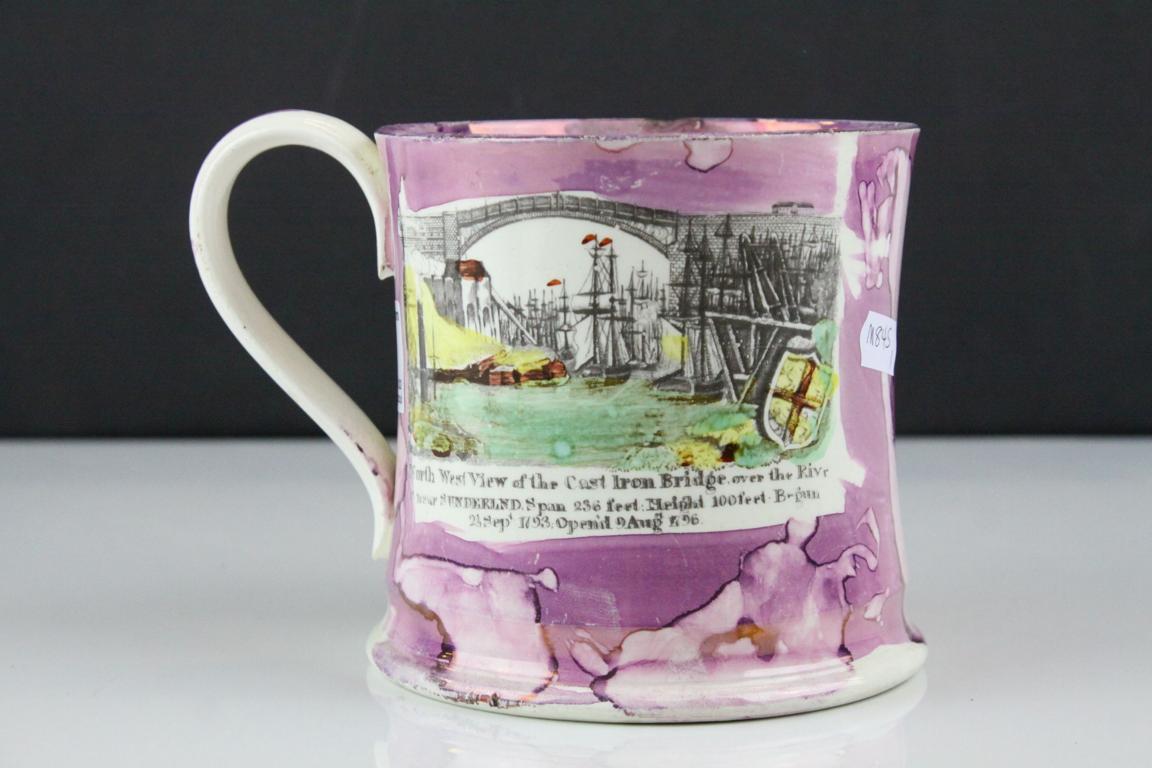 19th century Sunderland Pink Lustre Mug decorated with a scene of the North West View of the Cast