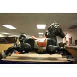 A vintage wall mounted black Mobo horse converted from rocker.