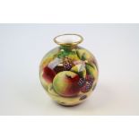 A 20th century porcelain vase hand decorated with Berries & Apples by former Royal Worcester