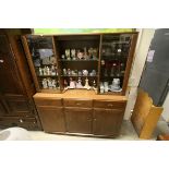 Ercol Stained Elm Display Cabinet with Two Glass Shelves flanked by Two Glass Doors enclosing