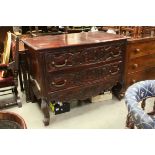 Continental Hardwood Chest of Three Long Drawers, the drawer fronts with heavy carved scrolls and