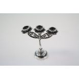 An Unusual silver small three arm candelabra