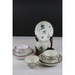 Eight Late 18th / Early 19th century Tea Bowls and Saucers together with a wooden display stand