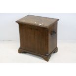 Late 19th / Early 20th century Oak Storage Box / Seat with hinged lift lid, metal handles and canted