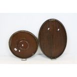 Two Early 20th century Wooden Gallery Trays with Twin Brass Handles, one oval 60cms long and the