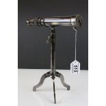 A brass Telescope on tripod stand