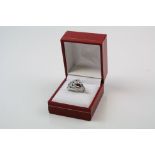 A silver Cartier style panther ring set with multi coloured CZ's