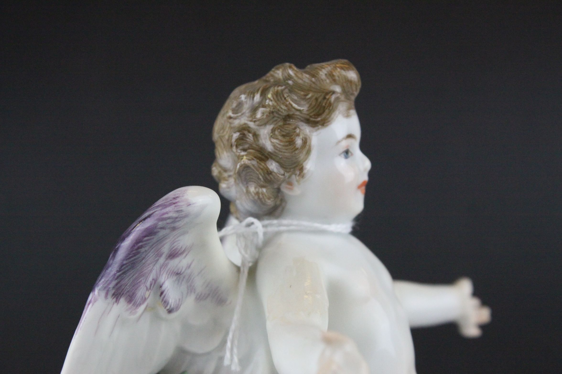 Meissen Porcelain Figure of Cupid with open arms, the base decorated with gilt scrolls, blue cross - Image 5 of 10