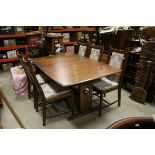 Ercol Stained Elm Draw-leaf Dining Table (160cms long unextended x 72cms high) together with Five