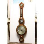 19th century Mahogany and Boxwood Cased Wheel Barometer / Thermometer, the silvered registers marked