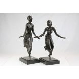 Pair of Russian patinated Bronze Figures of Stylised Dancing Girls, both signed indistinctly to