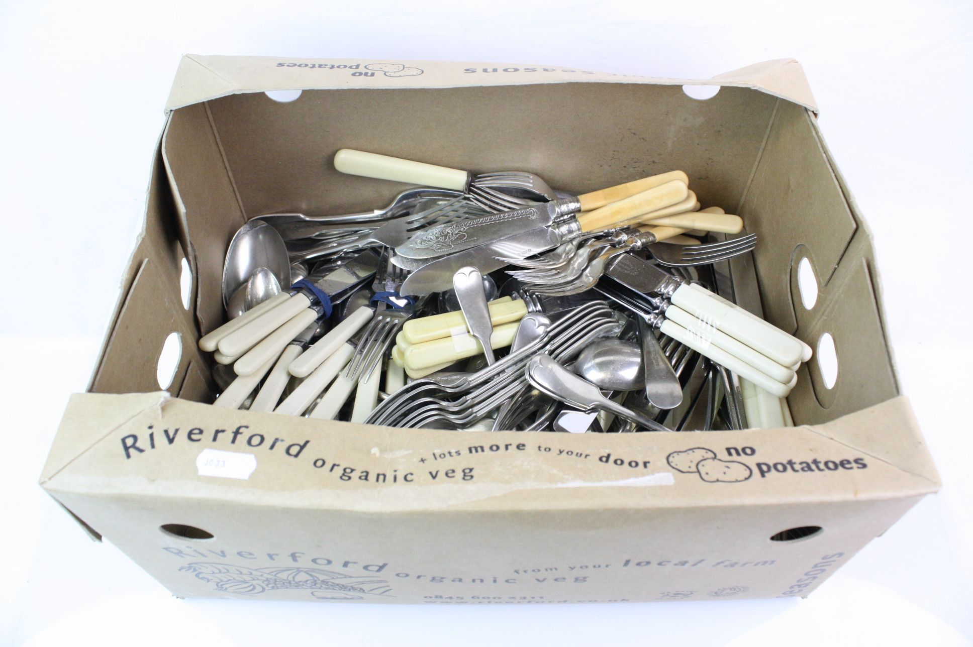 A box of mixed flatware to include silver plate and hallmarked silver collared examples.