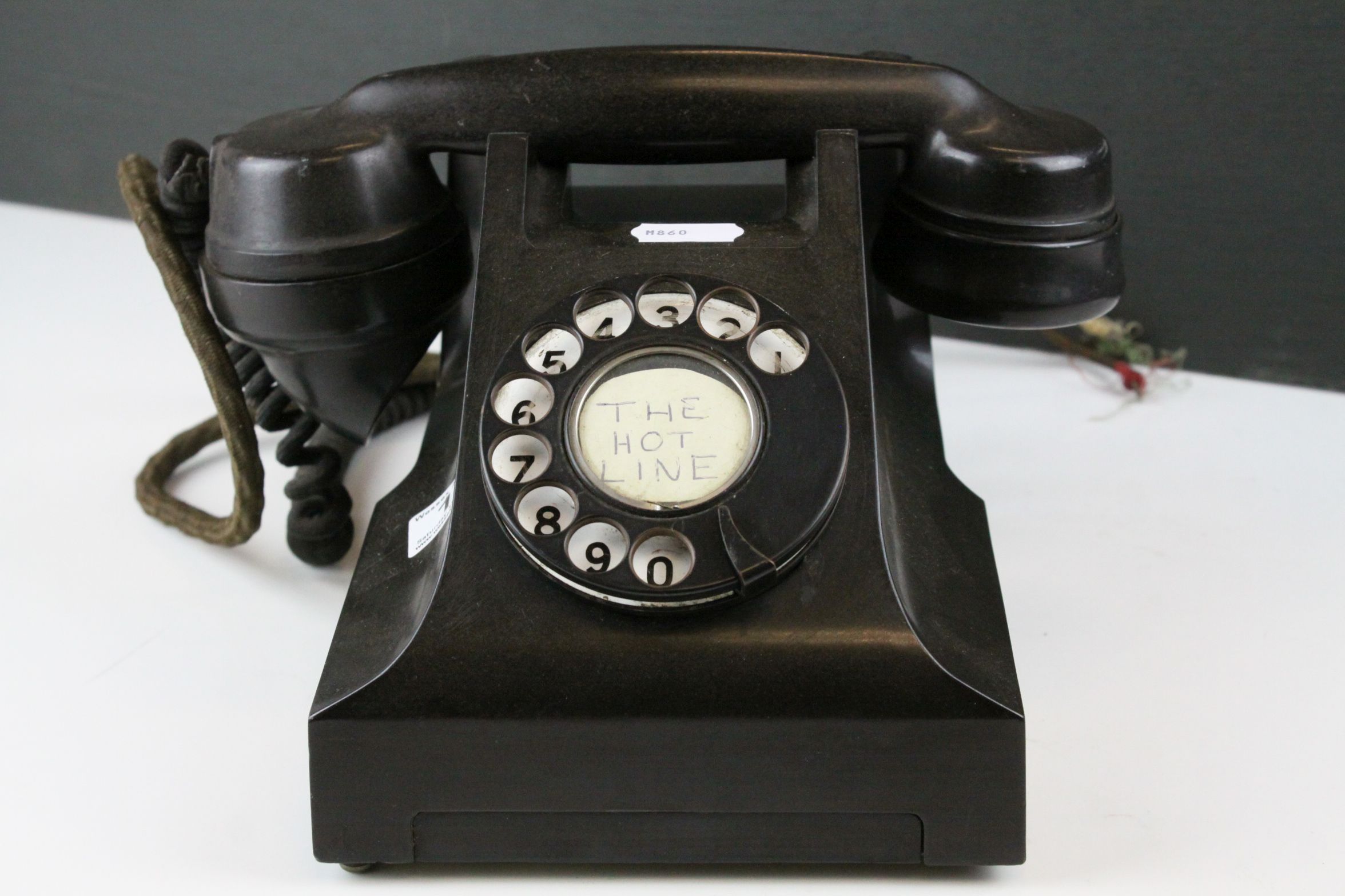 Vintage Black Bakelite ' ATM ' Telephone, label to base stating it orginated from the 'AE'shop,