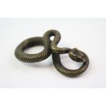 A brass/bronze snake figure.