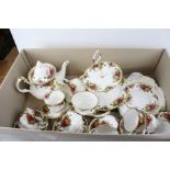A six place Royal Albert Country Roses teaset to include cakestand and teapot.