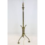 Early 20th century Brass Standard Lamp raised on Twisted Supports and Three Splayed Legs, 120cms