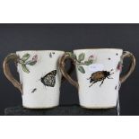 Pair of 19th century Continental Glazed Stoneware Twin Handled Mugs, the handles in the form of
