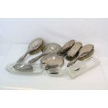 A collection of fully hallmarked sterling silver vanity items to include Brushes, Mirrors and Pin