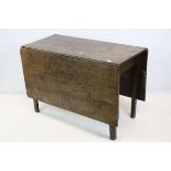 George III Oak Drop Flap Table raised on Square Legs, 109cms long x 74cms high
