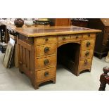 In the manner of Shapland and Petter, Arts and Crafts / Art Nouveau Oak Kneehole Writing Desk, the