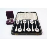 A cased set of six fully hallmarked sterling silver tea spoons together with a silver Royal Air