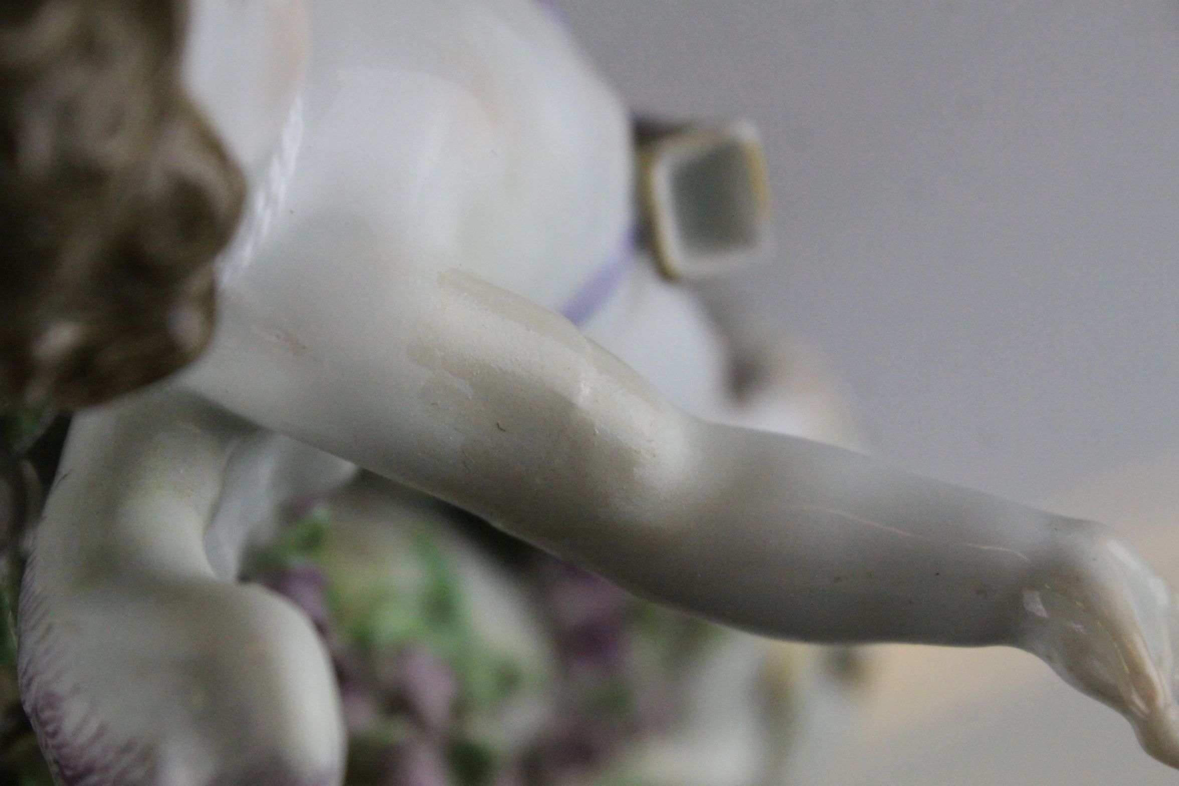 Meissen Porcelain Figure of Cupid with open arms, the base decorated with gilt scrolls, blue cross - Image 10 of 10