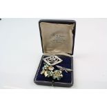 A small collection of vintage brooches to include a silver example in the form of a dragonfly.