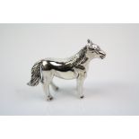 A sterling silver figure of a horse