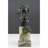 Patinated Bronze Bust signed E, Meier, raised on an Onyx Base with applied Bronze Leaves, 23cms