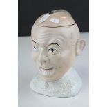 Ceramic Lidded Jar in the form of a Chinese Man, 17cms high