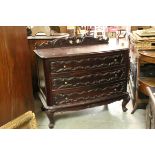 Hardwood Chest of Three Long Drawers with Carved Front, raised on short cabriole legs, 98cms wide