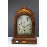 Edwardian Mahogany Inlaid Arched Top Three Train Mantle Clock, the engraved white metal face with