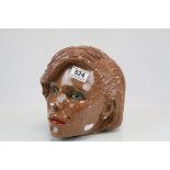 A retro style fibreglass head with a ceramic coating.
