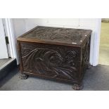 Heavily Carved Oak Coffer / Blanket Box, carved with a birds, a plume of feathers and scrolling