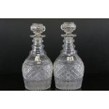 Pair of Georgian Decanters of squat club shape with prismatic ' hobnail ' decoration with a triple