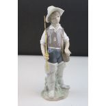 Lladro Figure ' Boy with Fishing Rod, model 4809, 23cms high