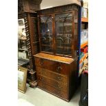 George III style Mahogany Bookcase, the upper section with twin glazed door, the lower section