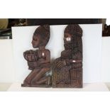 Two African Carved Hardwood Panels depicting a Tribal King / Chief and a Subject carrying Bowl of