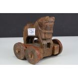 Carved Wooden Push-along Toy in the form of a Roman Horse, 15cms high