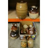 A quantity of stoneware harvest jugs,bottles and a spirit barrel.