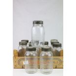 Twelve Mid 20th century Kilner Jars with screw-on lids, 18cms high
