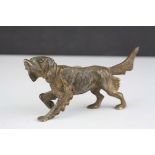 Bronze figure of a trotting retriever hunting dog