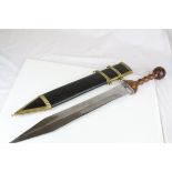 Sword with wooden handle and pommel, leather scabbard with brass fittings